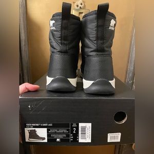 Sorel waterproof boots, like new worn once.